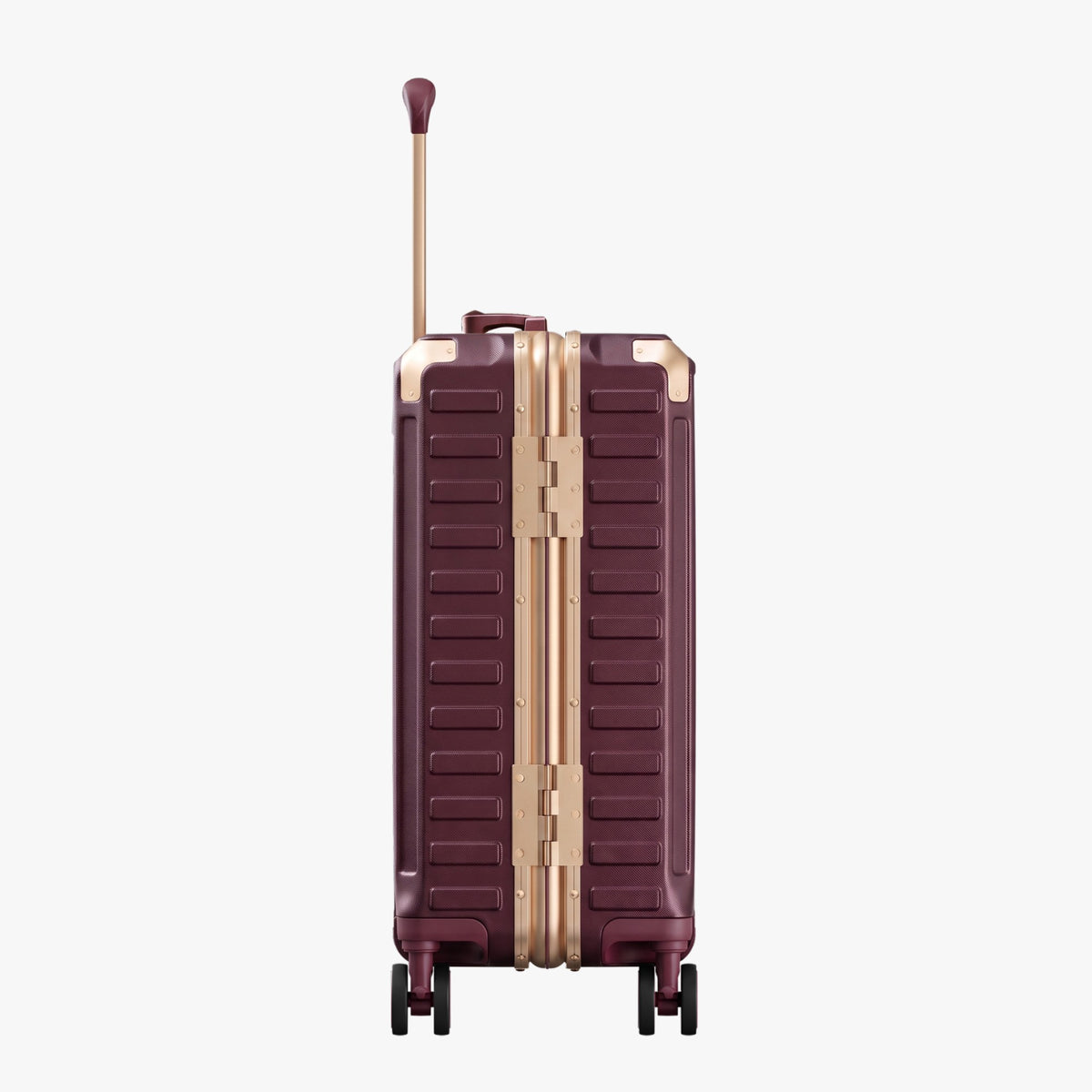 Side view of aluminum frame luggage with protective foot pads that elevate the shell and prevent scratches when the suitcase is placed on the ground. #show #color_cherry