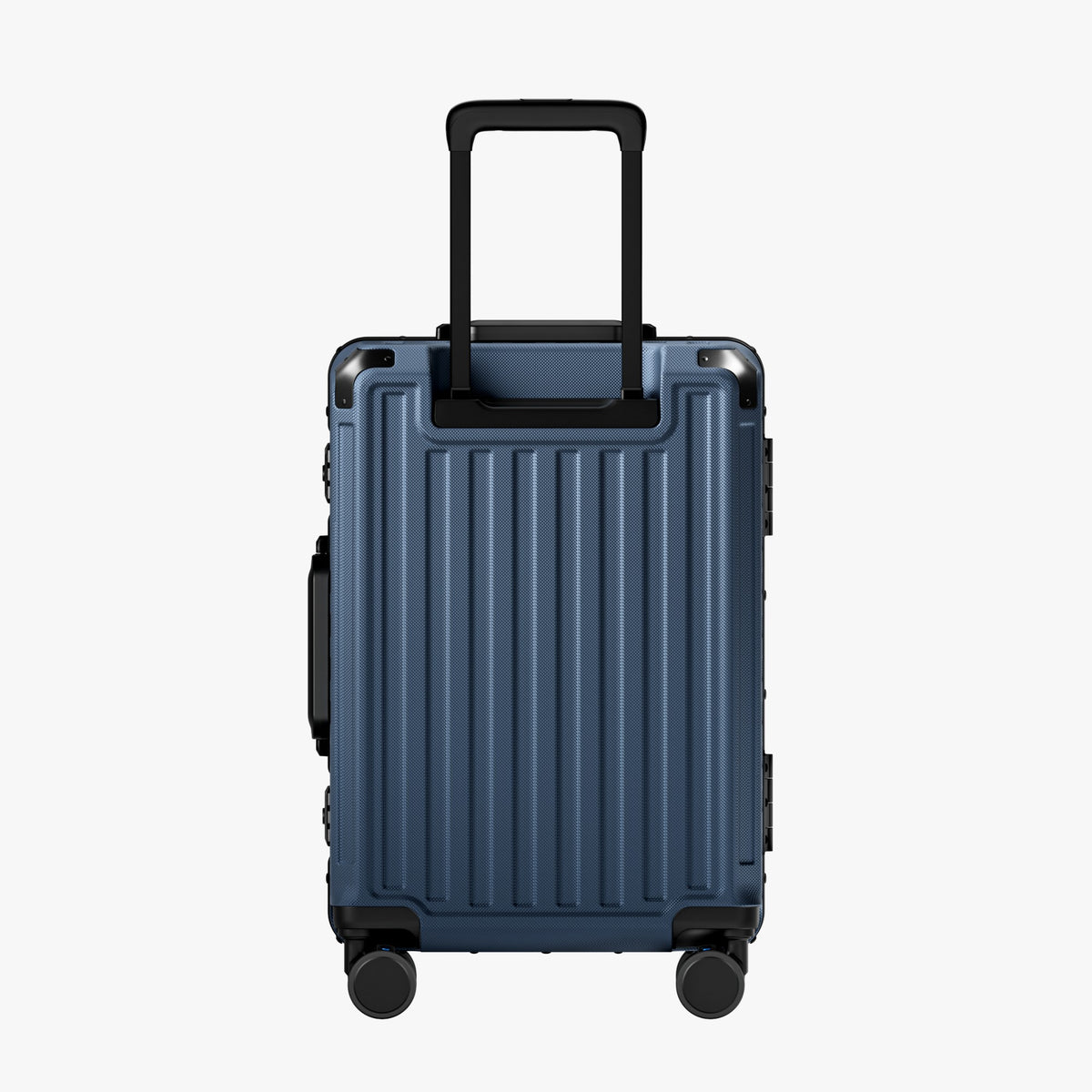 Side view of aluminum frame luggage with protective foot pads that elevate the shell and prevent scratches when the suitcase is placed on the ground. #show #color_navy_blue