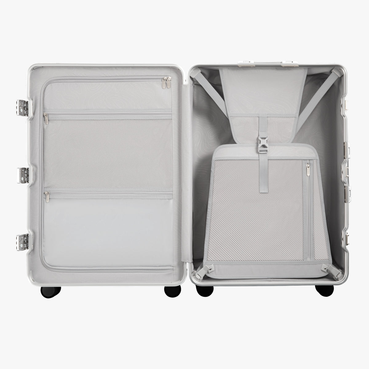 Open view of the LUGGEX aluminum-frame zipperless suitcase showing upgraded interior with greater flexibility, smarter organization, and a waterproof pocket.
#color_charcoal #show