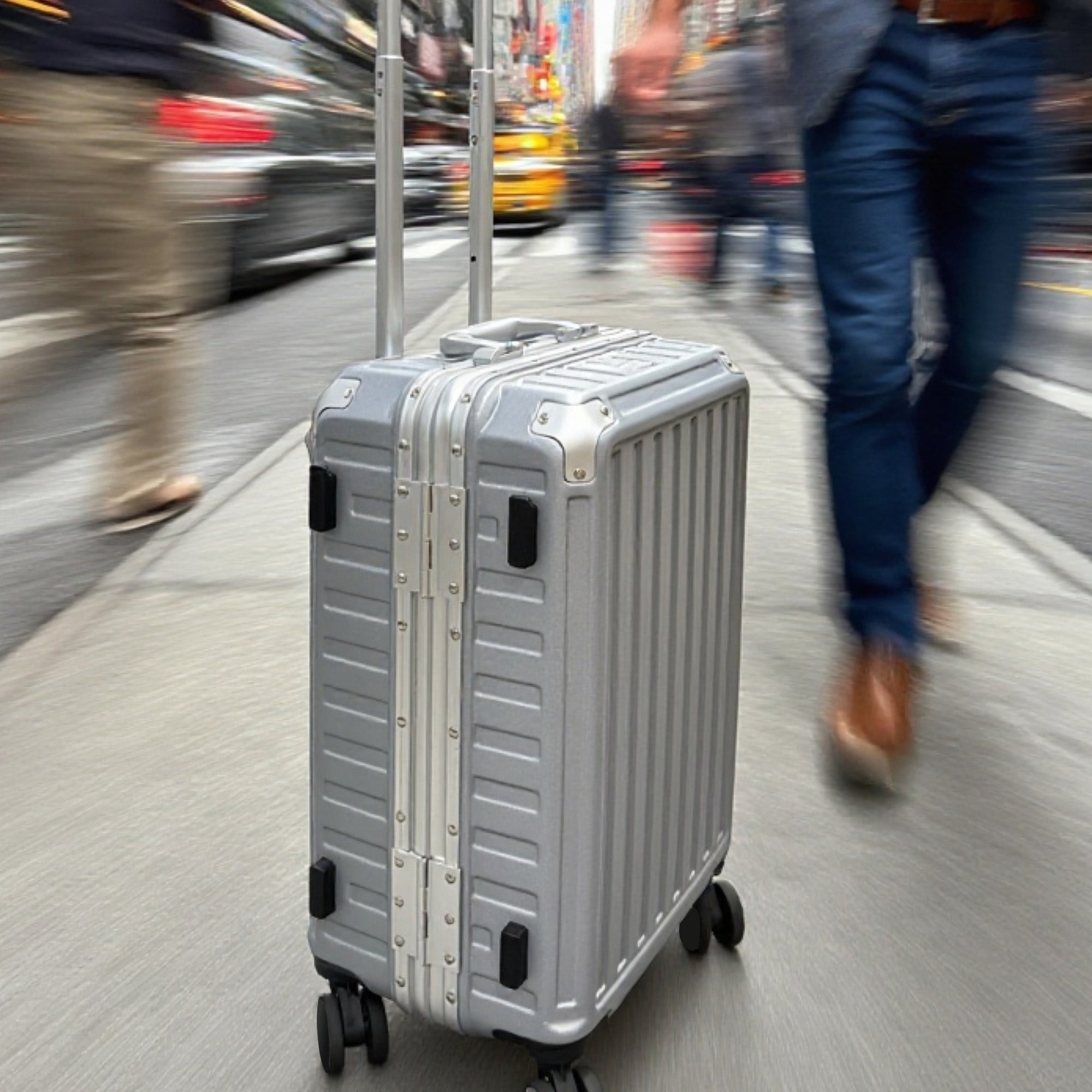 LUGGEX aluminum frame carry-on luggage suitcase with spinner wheels used for travel on city streets
#color_charcoal