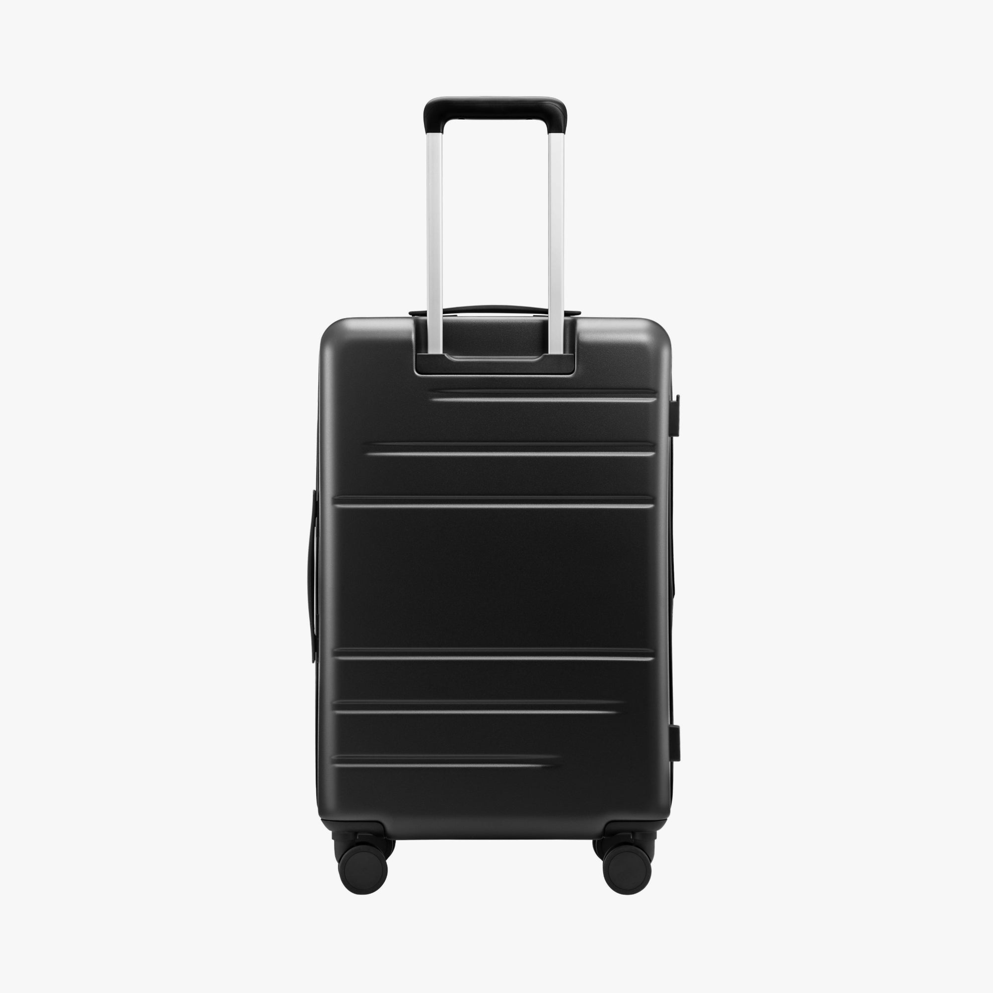 Back view of LUGGEX FLO 5 24-inch charcoal zipper suitcase made from 100% polycarbonate, featuring a telescopic handle and side footrest that doubles as a hanging hook for bags or small items.