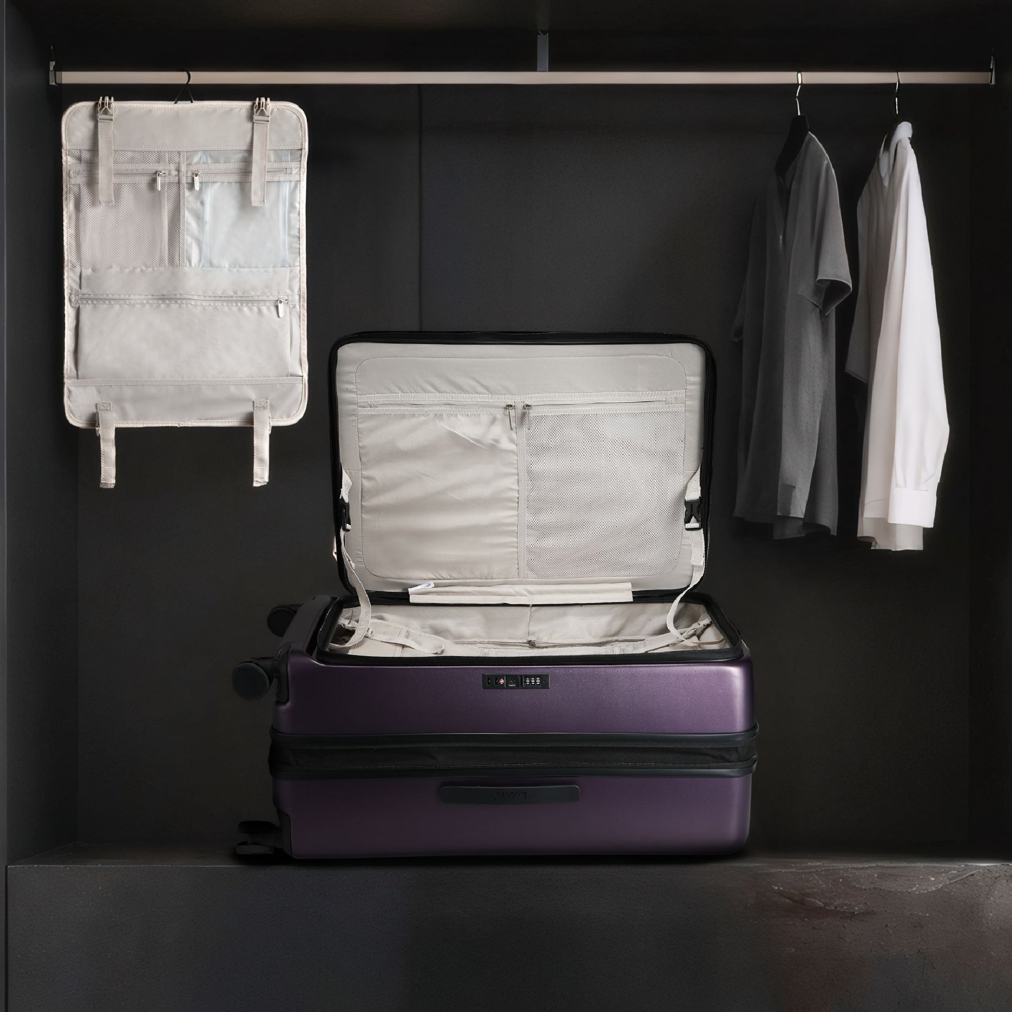 LUGGEX FLO5 28-inch top-open check-in luggage with a removable hanging organizer, designed for easy unpacking and organized packing in hotels or closets.
#color_purple #show