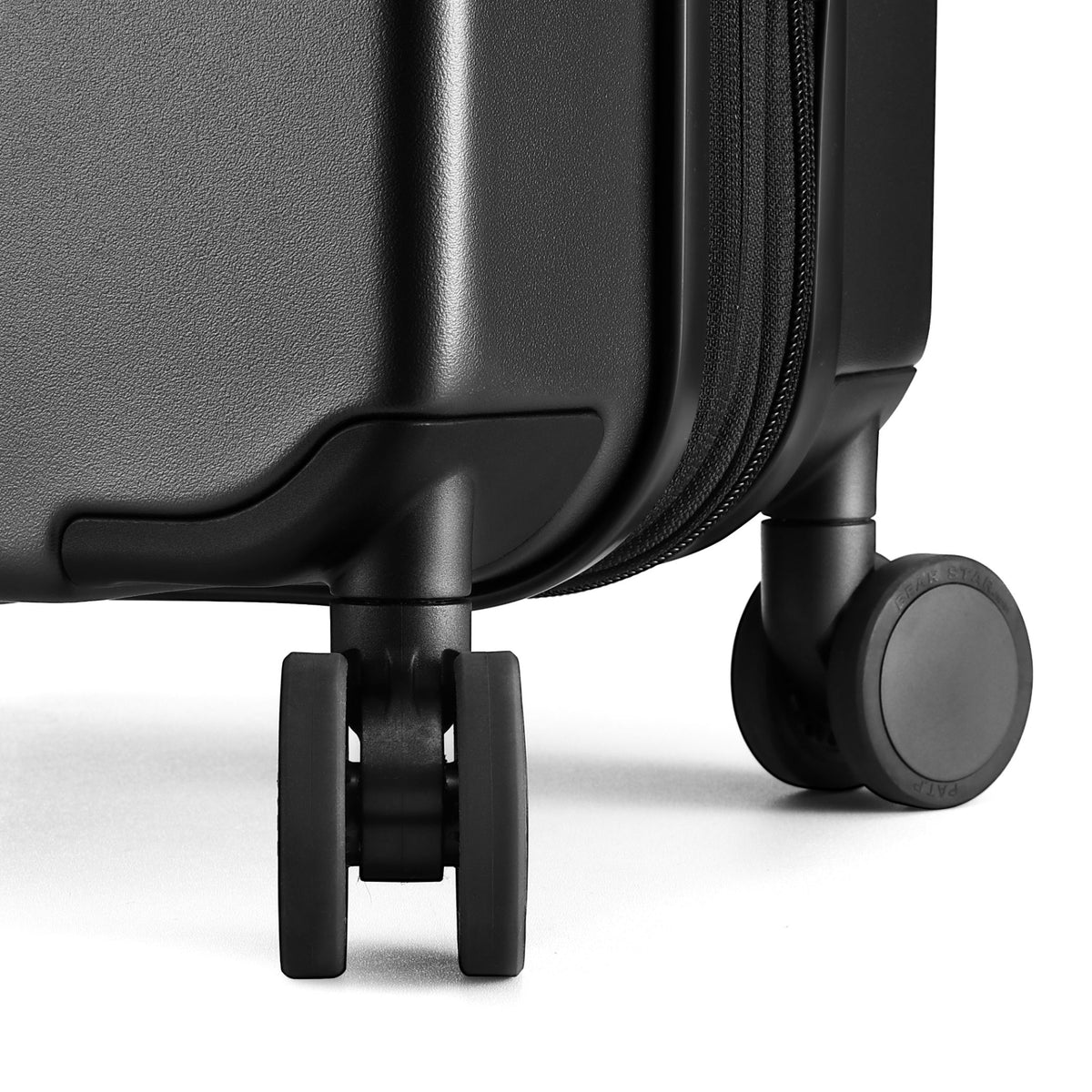 Close-up of LUGGEX luggage 360° silent spinner wheels. Made with durable TPE material for long-lasting performance, providing a smooth, butter-like glide on any surface.
#color_black #show