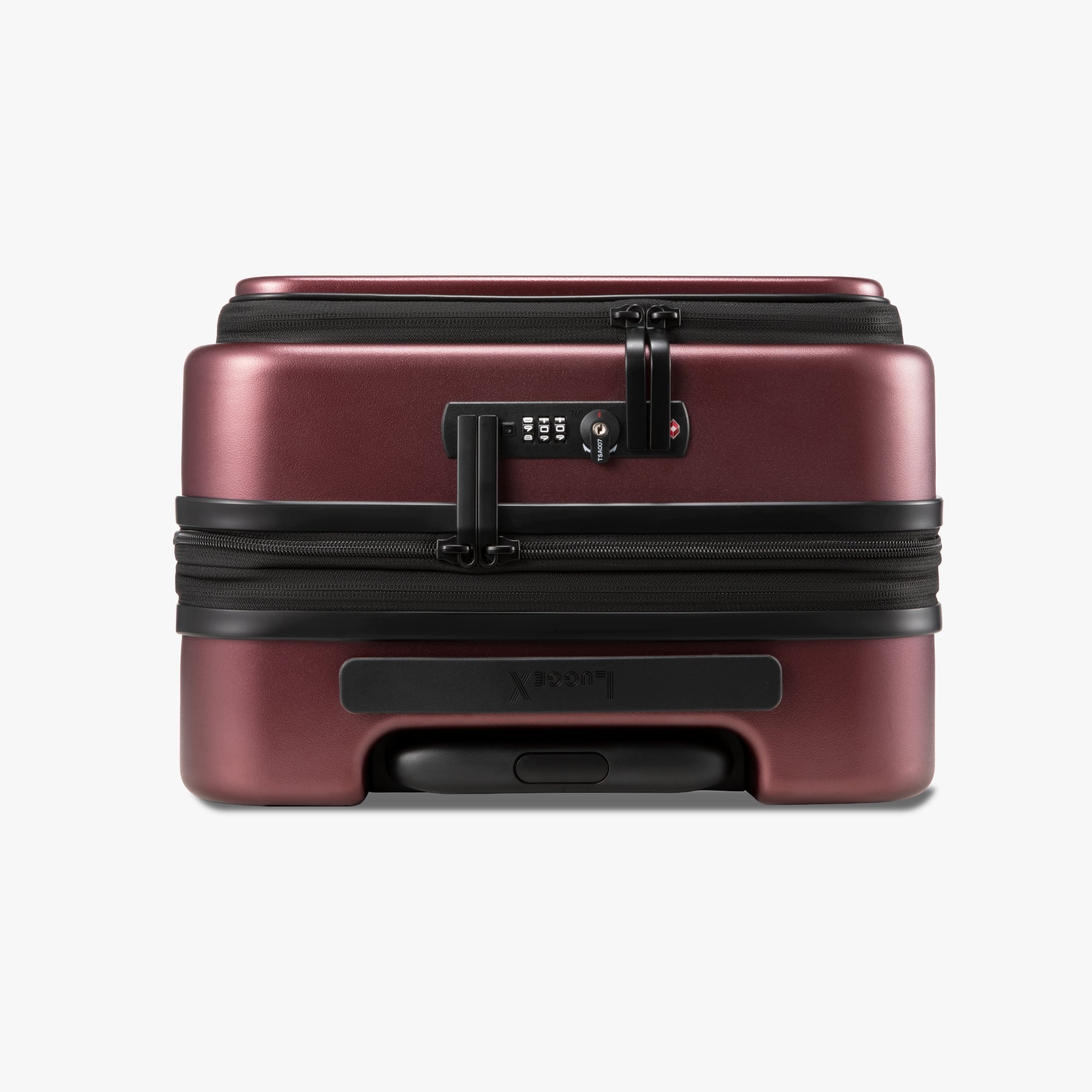 Close-up of dual TSA lock and expandable zipper on Luggex FLO 5 Core 20-inch carry-on suitcase.