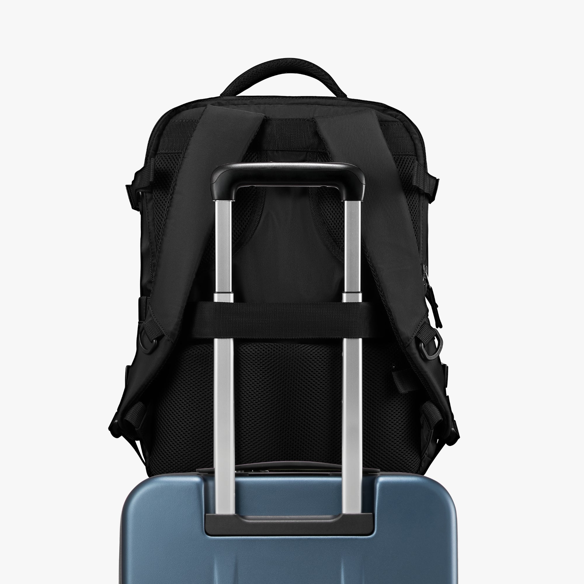 Close-up of ergonomic top handle on LUGGEX FLO 5 Core 20-inch carry-on suitcase for comfortable lifting. and bag-friendly