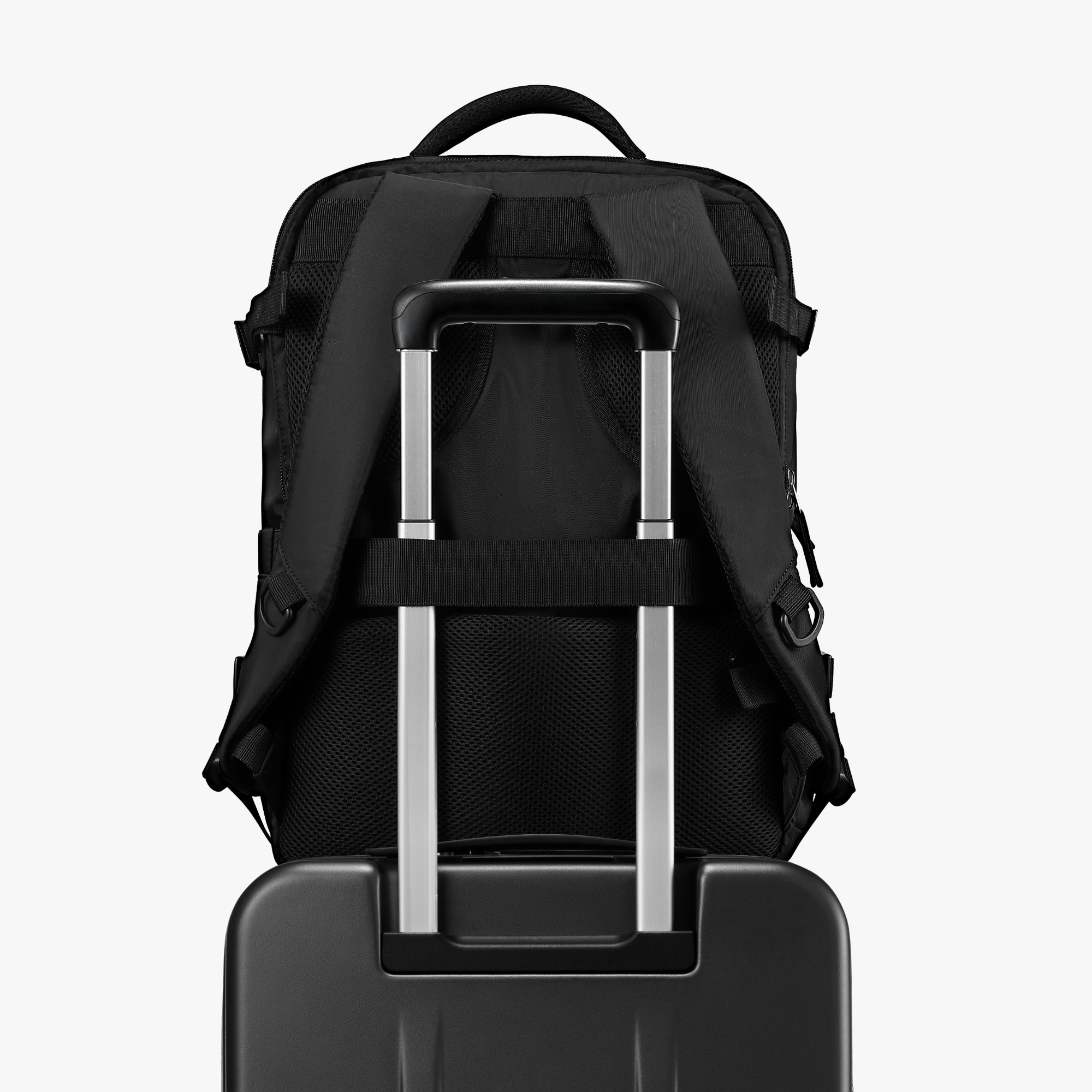 Close-up of ergonomic top handle on LUGGEX FLO 5 Core 20-inch carry-on suitcase for comfortable lifting.