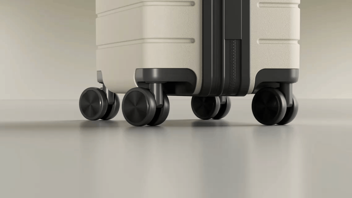 HUP3 New Carry-On Luggage with Silent Wheels Gliding Smoothly Like Butter - Close-Up of Durable Spinner Design for Effortless Airport Maneuverability