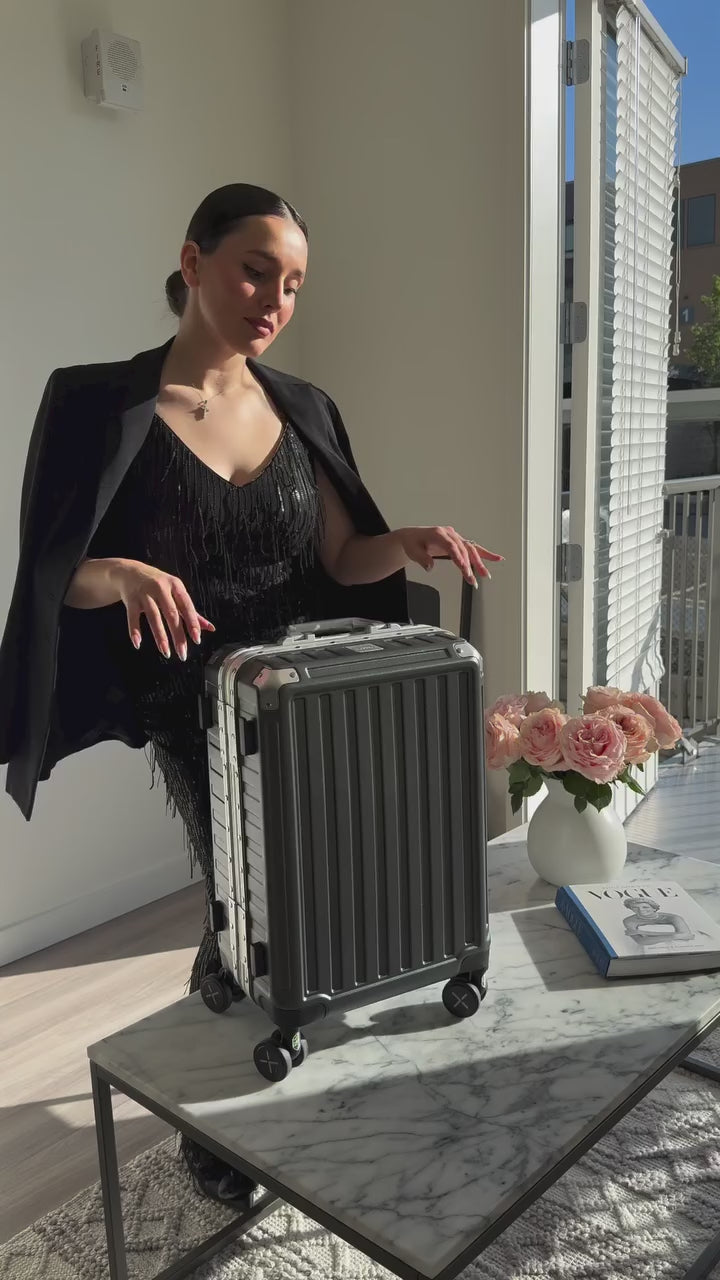 LUGGEX 20-inch aluminum frame carry-on luggage suitcase featured in lifestyle shoot, stylish travel accessory #color_Blue