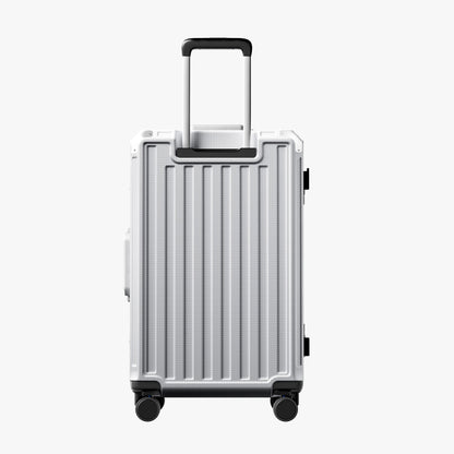 Side view of 24'' aluminum frame trunk luggage with a 4:6 trunk structure and protective foot pads that prevent scratches and wear when placed on the ground.  
