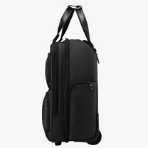 Side view of 16-inch underseat carry-on luggage with wheels, showing a slim profile, smooth-rolling wheels, and multiple zippered side pockets. 
