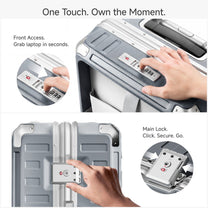 Silver hardshell luggage with front-access TSA combination lock for quick laptop retrieval and one-touch main lock system. #color_sliver_grey
