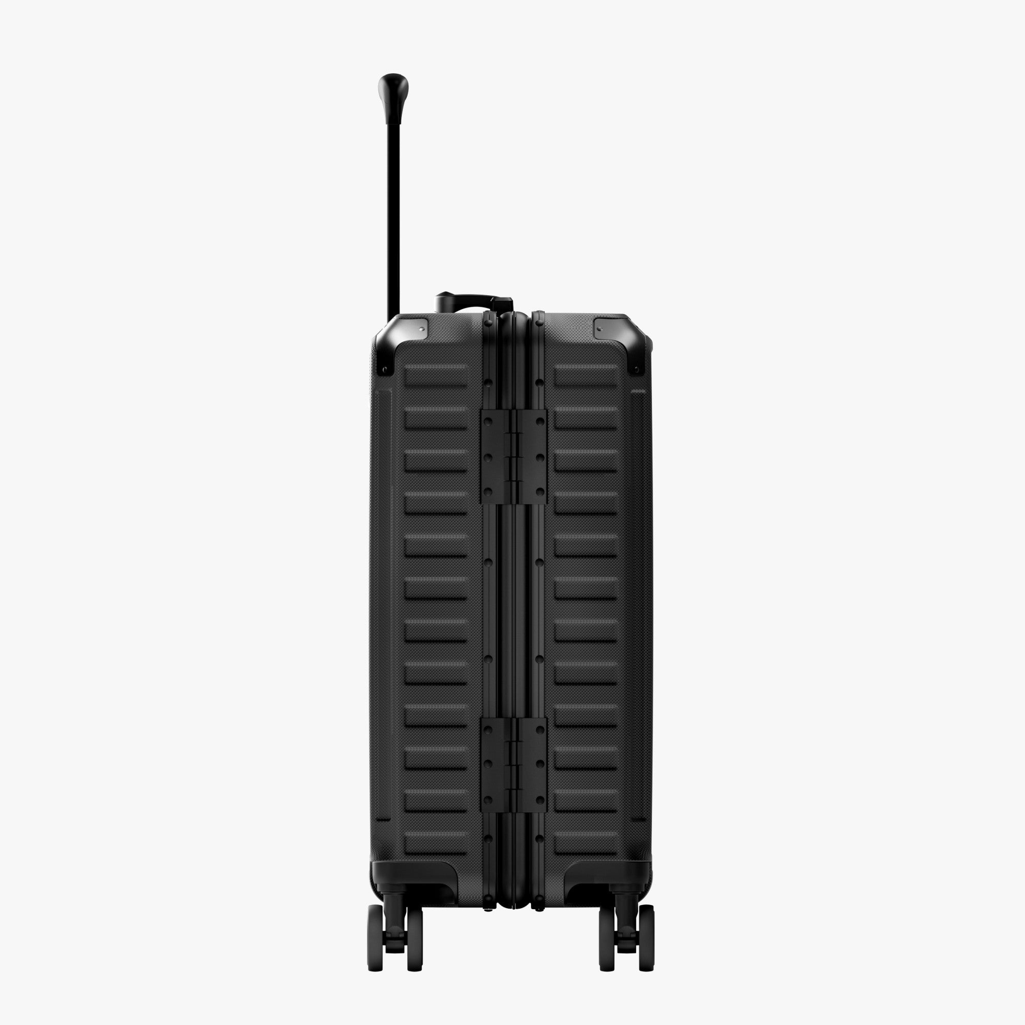 Side view of aluminum frame luggage with protective foot pads that elevate the shell and prevent scratches when the suitcase is placed on the ground. #show #color_black