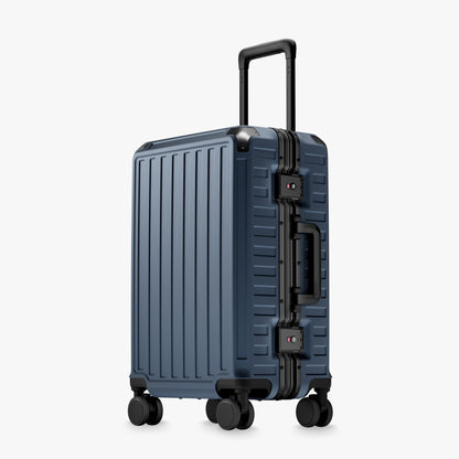 Front view of a carry-on suitcase with a 100% polycarbonate shell, designed for lightweight durability and impact resistance. "Cabin-Ready · 1–4 Days"#show #color_navy_blue