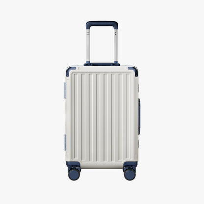 Side view of aluminum frame luggage with protective foot pads that elevate the shell and prevent scratches when the suitcase is placed on the ground. #show #color_white_blue