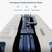 Exploded view of aluminum frame luggage showing 100% polycarbonate shell, reinforced corner protectors, TSA-approved locks, aluminum frame structure, and 360-degree shock-absorbing spinner wheels. #color_white_blue