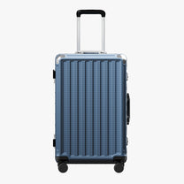 Back view of an aluminum frame check-in  suitcase with spinner wheels and a telescopic handle, designed for durable and smooth travel. 