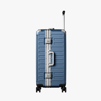 Back view of an aluminum frame check-in  suitcase with spinner wheels and a telescopic handle, designed for durable and smooth travel. 