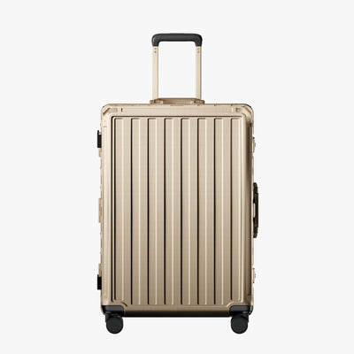 LUGGEX carry-on luggage in silver with silver aluminum frame — front, back, and side views showing zipperless hard shell, TSA lock, and spinner wheels. 