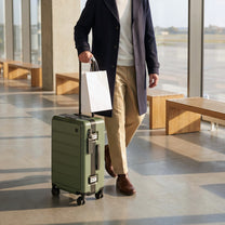 100% polycarbonate hard shell, and reinforced aluminum frame for durable protection and long-term travel use. #LUGGEX zipperless bigger carry-on suitcase with front-open design, 100% polycarbonate hard shell, and aluminum frame for durable, secure, and easy-access travel. #color_olive_green  #show
