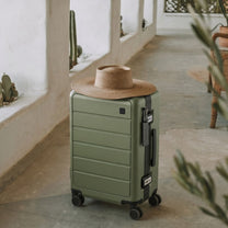 Back and side view of LUGGEX zipperless carry-on suitcase showing adjustable telescopic handle and reinforced aluminum frame for stable and durable travel. #show #color_black