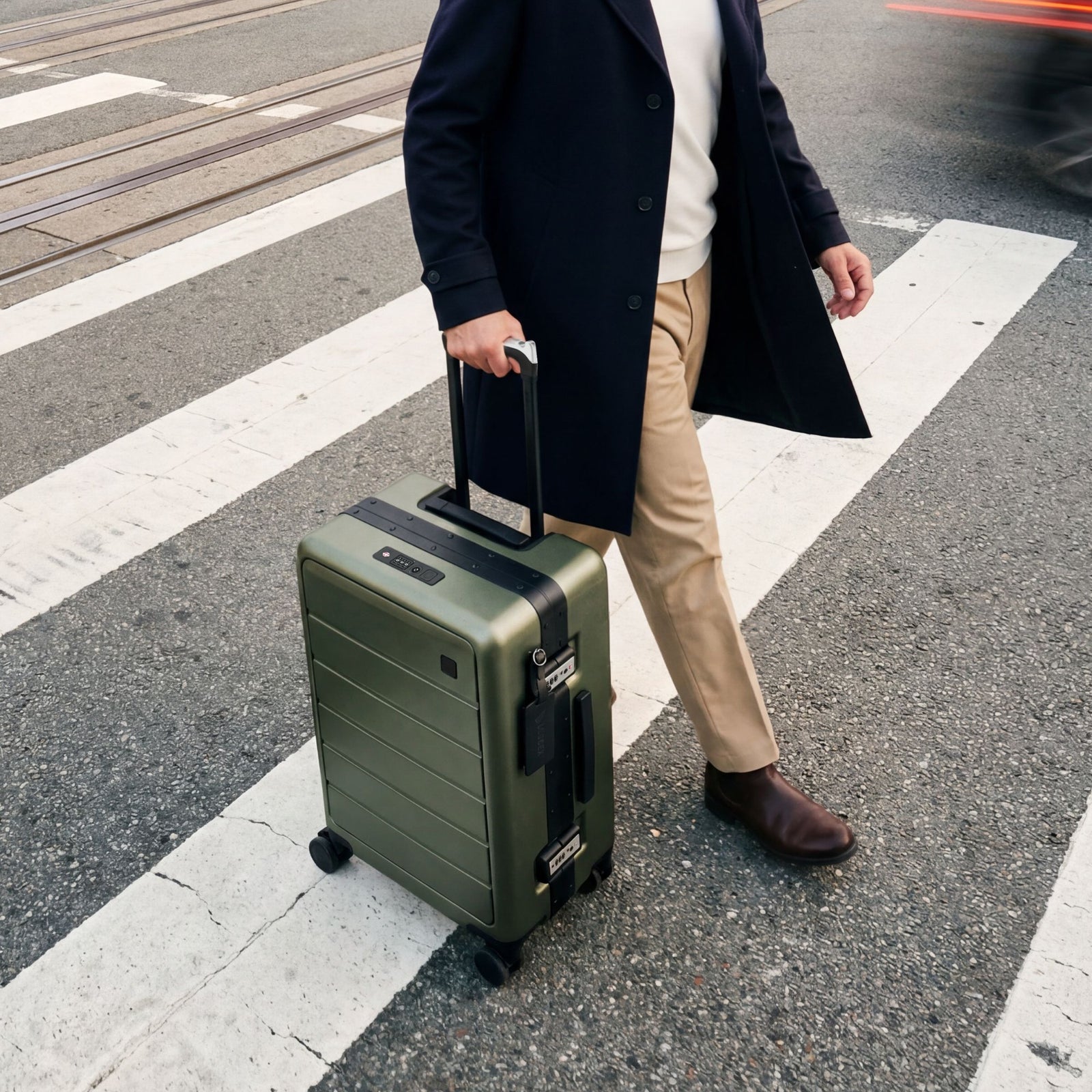 Back and side view of LUGGEX zipperless carry-on suitcase showing adjustable telescopic handle and reinforced aluminum frame for stable and durable travel. #show #color_black