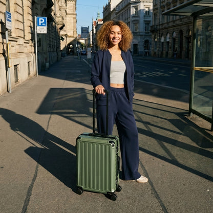 100% polycarbonate hard shell, and reinforced aluminum frame for durable protection and long-term travel use. #LUGGEX 21-inch zipperless bigger carry-on suitcase with aluminum frame and 100% polycarbonate hard shell, TSA locks, and smooth spinner wheels for durable, lightweight travel. #color_olive_green #show