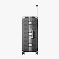 LUGGEX Zipperless aluminum 28-inch check-in luggage with a 4-stage adjustable handle, reinforced corners, dual TSA-approved locks, removable privacy divider, and shock-absorbing spinner wheels. 