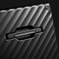 LUGGEX trunk check-in suitcase with reinforced aluminum corner protection designed to help guard against impacts during travel. 