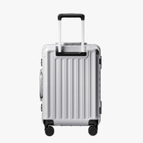 Back view of an aluminum frame carry-on suitcase with spinner wheels and a telescopic handle, designed for durable and smooth travel. 