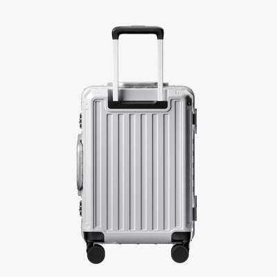 Back view of an aluminum frame carry-on suitcase with spinner wheels and a telescopic handle, designed for durable and smooth travel. 