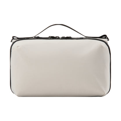 LUGGEX convertible crossbody organizer bag back view with smooth padded exterior #color_beige #show