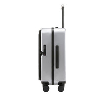 LUGGEX FLA front open carry-on suitcase with reinforced side foot pads and rivet-free aluminum frame—designed to protect the shell when placed on its side.

