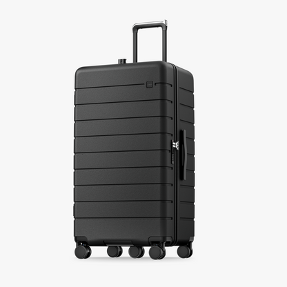 HUP 30-inch trunk-style check-in luggage with deep 115L capacity, 5 shock-absorbing spinner wheels, and TSA lock, designed for stable and smooth long-distance travel #color_black