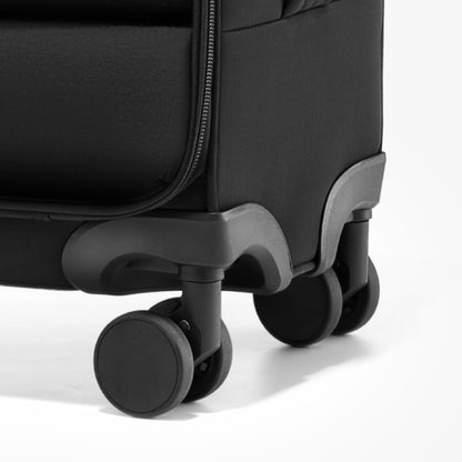 Close-up of LUGGEX 16-inch underseat carry-on luggage featuring 8 smooth and silent spinner wheels for stable and effortless rolling during travel.

