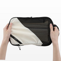 Soft ripstop fabric paired with high-density mesh for durable construction and easy visibility inside. #show 