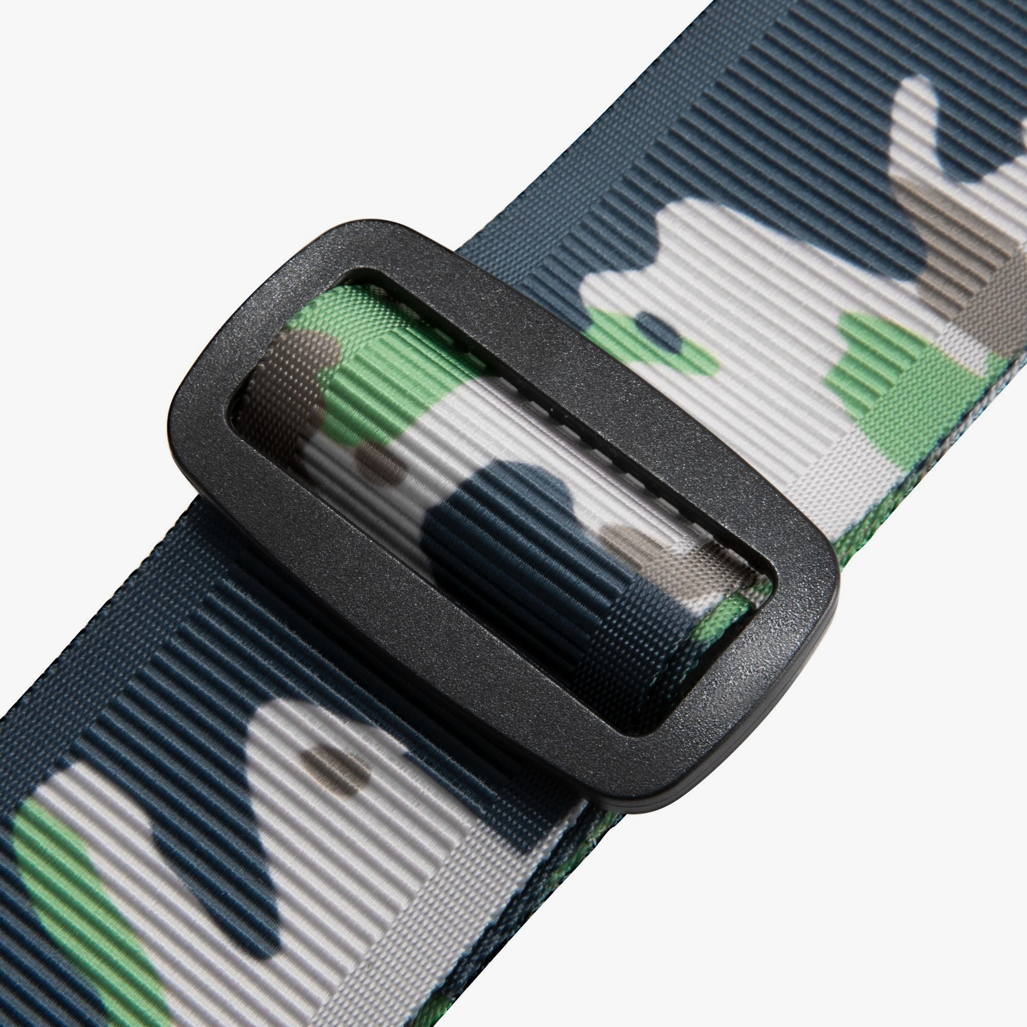 Ensures a snug fit for added stability during transit. Features an adjustable strap design to fit a wide range of suitcase sizes. #color-camouflage #show