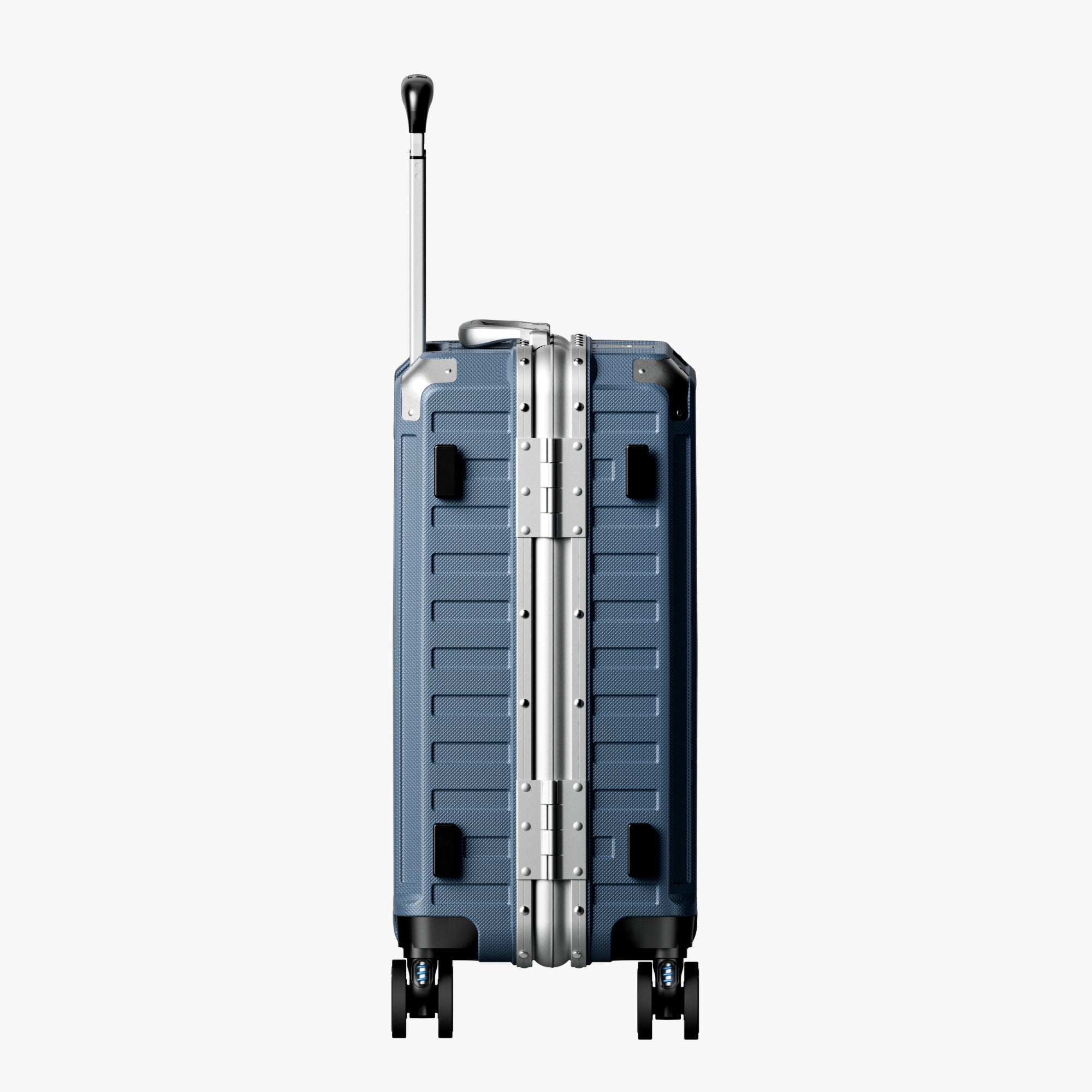 Side view of aluminum frame luggage with protective foot pads that elevate the shell and prevent scratches when the suitcase is placed on the ground. #show #color_blue