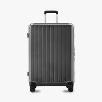 Front view of the LUGGEX ZX Series charcoal aluminum-frame zipperless luggage set featuring 20-inch carry-on and 28-inch check-in suitcases, showcasing sleek design and modern durability.
