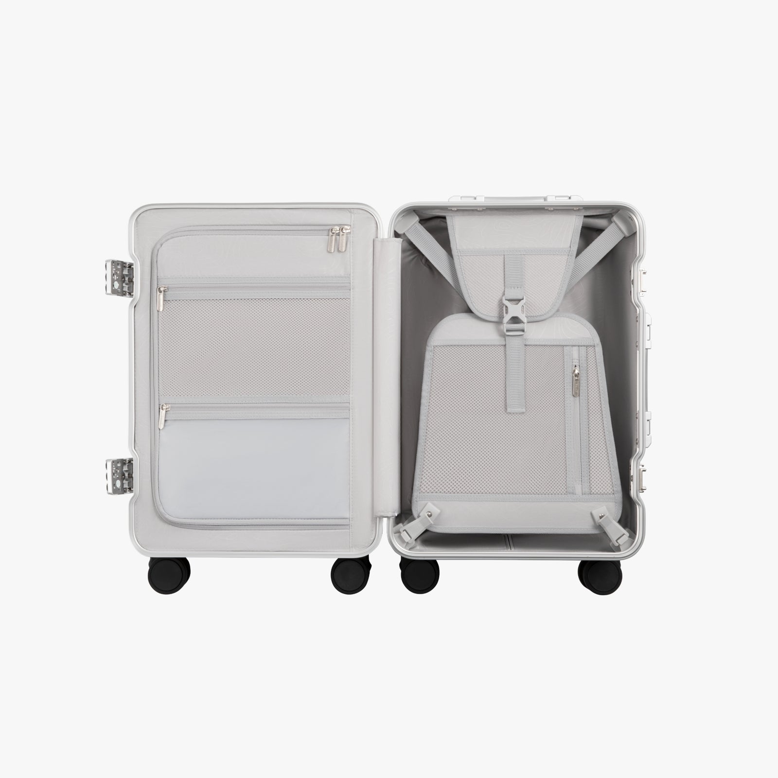 Open view of the LUGGEX 20-inch charcoal aluminum-frame zipperless check-in suitcase showing upgraded interior with greater flexibility, smarter organization, and a waterproof pocket.
