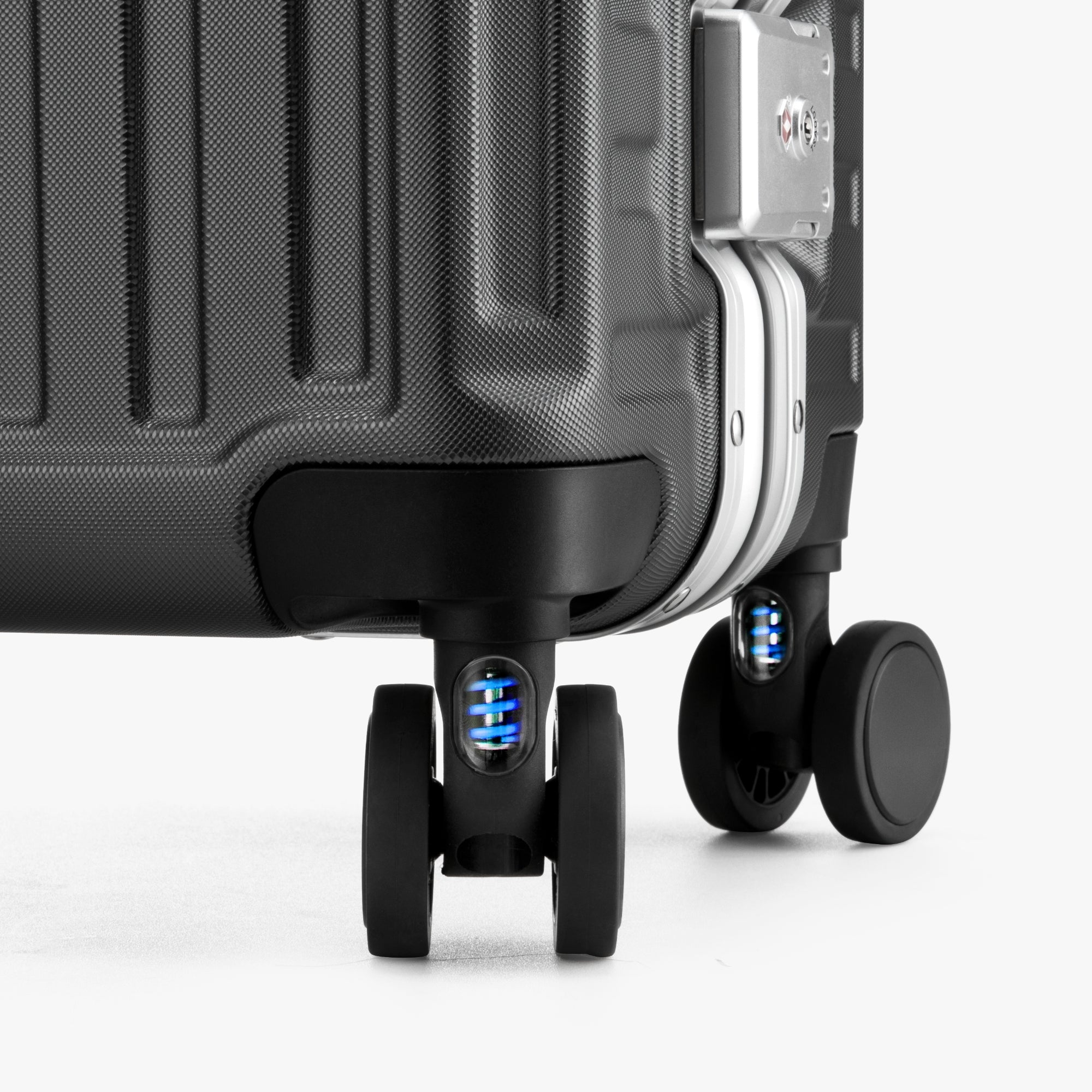 Close-up of LUGGEX 20-inch suitcase silent spinner wheels with shock-absorbing blue springs 
#color-charcoal