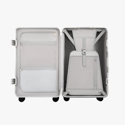 Open view of the LUGGEX 24-inch charcoal aluminum-frame zipperless check-in suitcase showing upgraded interior with greater flexibility, smarter organization, and a waterproof pocket. 