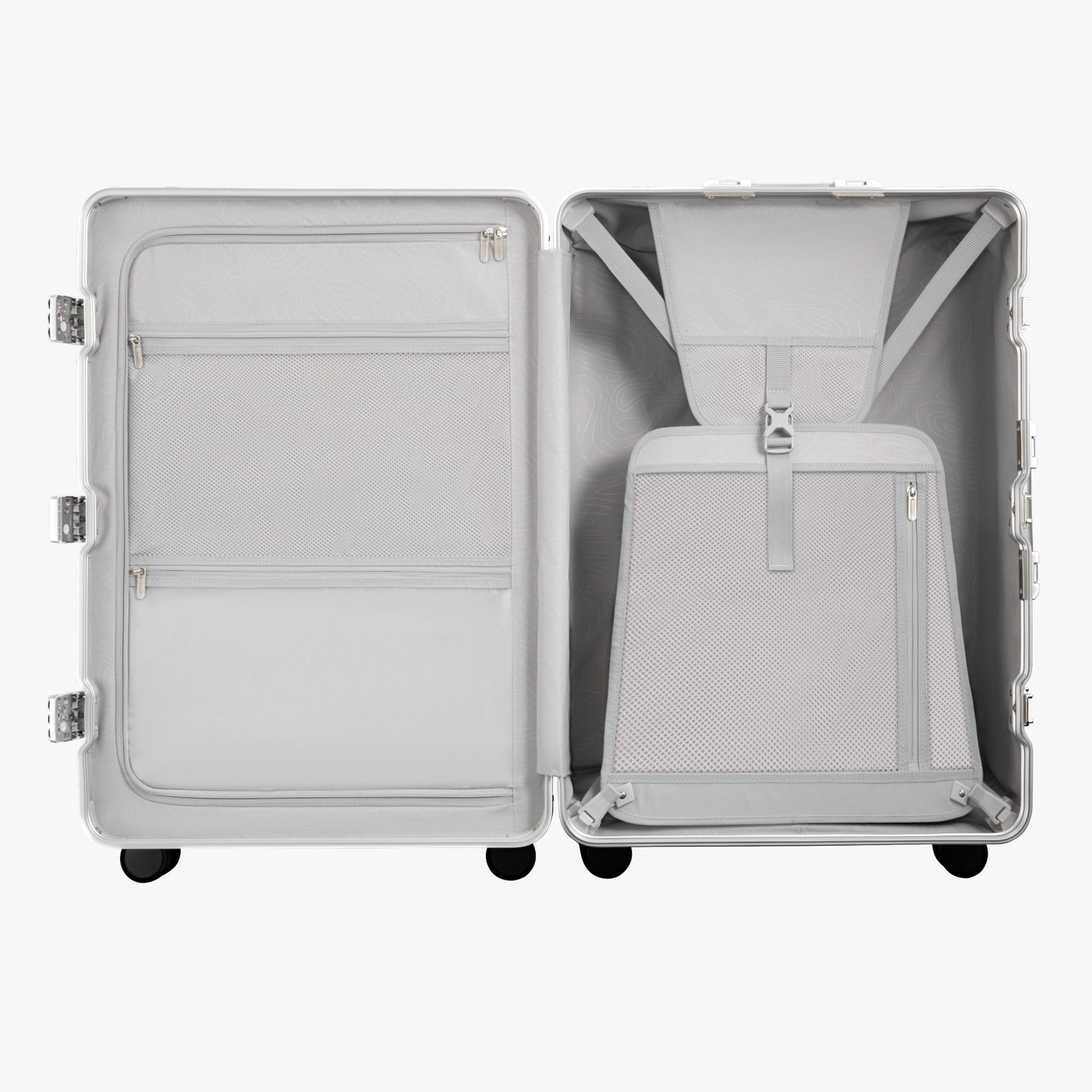 Open view of the LUGGEX 28-inch blue aluminum-frame zipperless check-in suitcase showing upgraded interior with greater flexibility, smarter organization, and a waterproof pocket.

