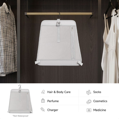 Removable hanging organizer from the LUGGEX 28-inch sliver grey aluminum-frame zipperless suitcase, designed for hair and body care, cosmetics, socks, perfume, chargers, and medicine storage. 