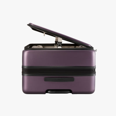 Side view of LUGGEX FLO5 28-inch top-open check-in luggage showing the 1:9 split design, allowing access with only half the footprint.
#color_purple #show