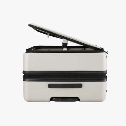 LUGGEX FLO5 28-inch top-open check-in luggage, made from 100% polycarbonate. Space-saving design uses 50% less space—half the footprint and double the convenience—ideal for cars, hotels, and tight spaces. 
