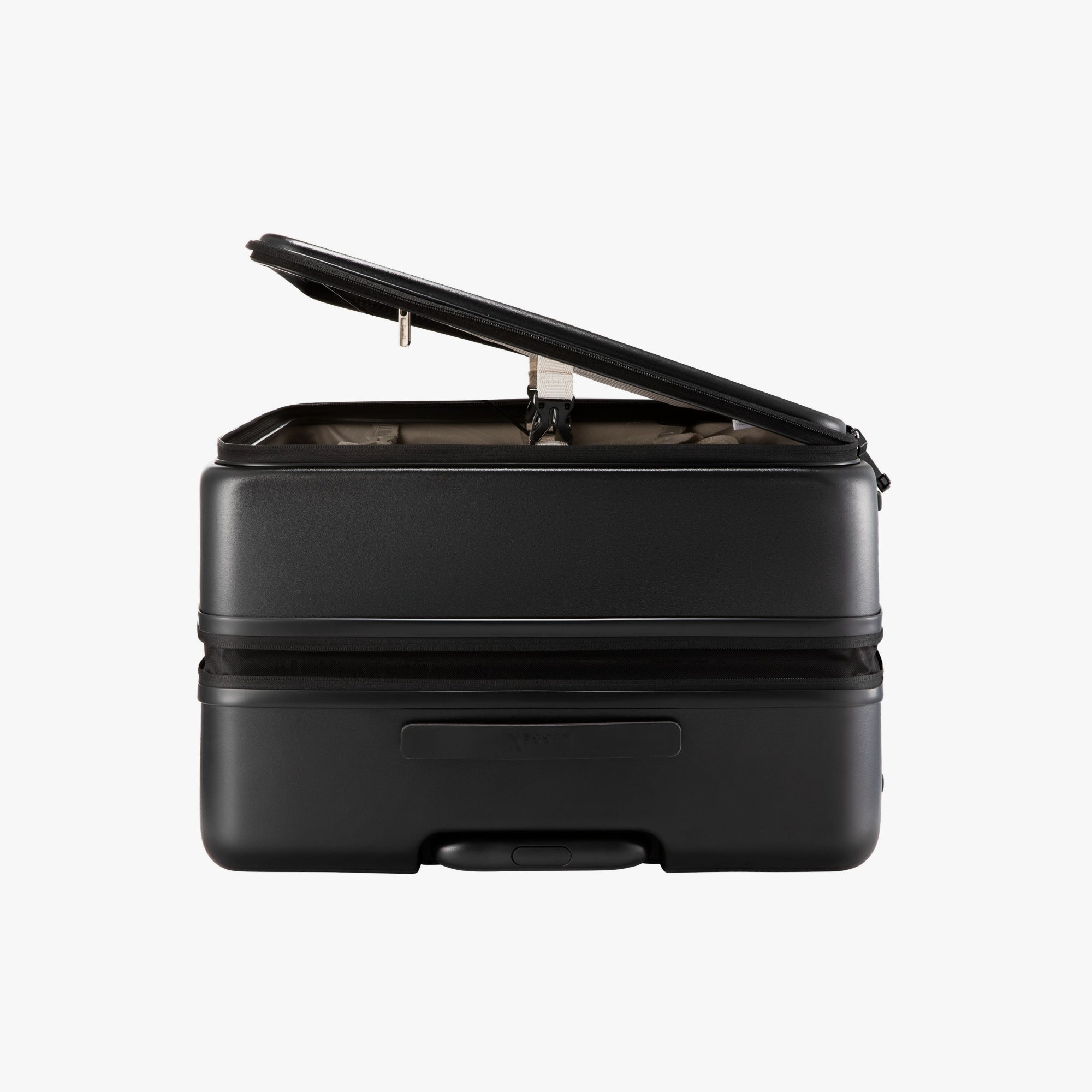 LUGGEX FLO5 28-inch top-open check-in luggage, made from 100% polycarbonate. Space-saving design uses 50% less space—half the footprint and double the convenience—ideal for cars, hotels, and tight spaces.  #charcoal_metallic