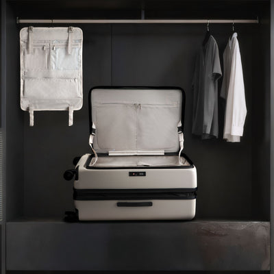 LUGGEX FLO5 28-inch top-open check-in luggage with removable hanging interior organizer. Space-saving design allows travelers to unpack easily in hotels or closets, ideal for efficient and organized packing.
