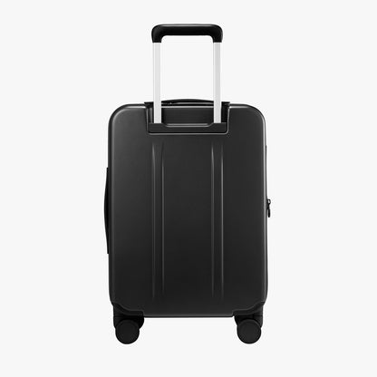 Back view of LUGGEX FLO 5 Core 20-inch 100% polycarbonate carry-on suitcase with retractable handle and smooth design. 