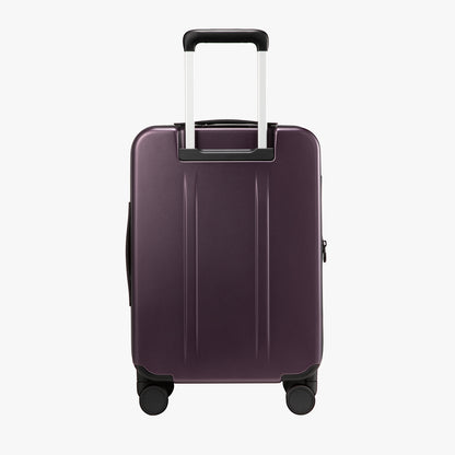 Back view of LUGGEX FLO 5 Core 20-inch 100% polycarbonate carry-on suitcase with retractable handle and smooth design. 