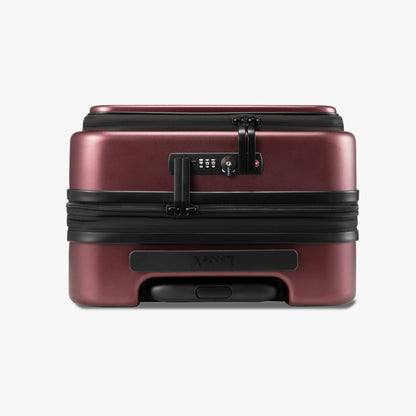 Close-up of dual TSA lock and expandable zipper on Luggex FLO 5 Core 20-inch carry-on suitcase. 